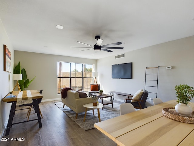 living room with a ceiling fan, dark wood-type flooring, baseboards, and recessed lighting
