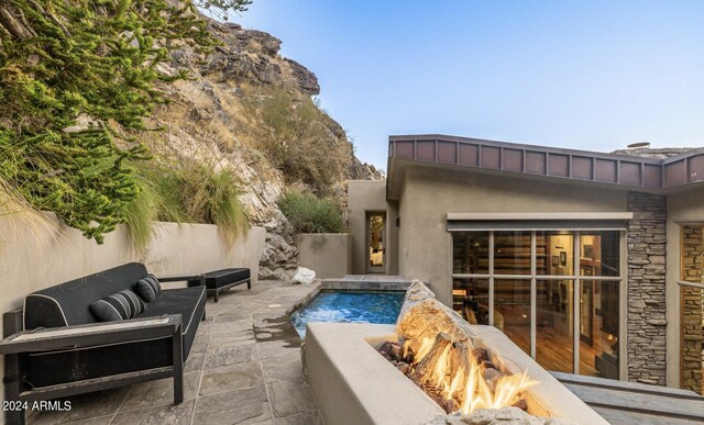 view of swimming pool featuring a patio and outdoor lounge area