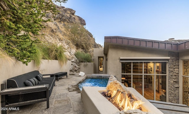 view of pool with a patio and fence