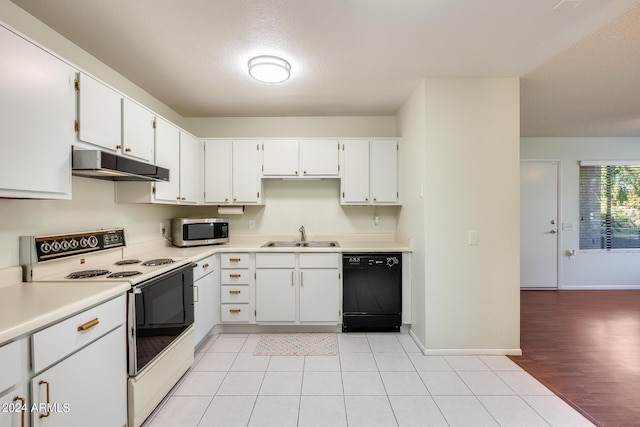 14300 W Bell Rd Unit 35, Surprise, AZ 85374 - kitchen featuring dishwasher, stainless steel microwave, under cabinet range hood, electric stove, and a sink