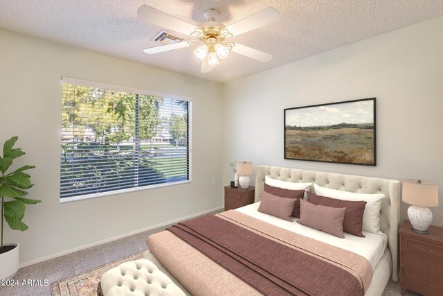 14300 W Bell Rd Unit 35, Surprise, AZ 85374 - carpeted bedroom featuring visible vents, baseboards, ceiling fan, and a textured ceiling