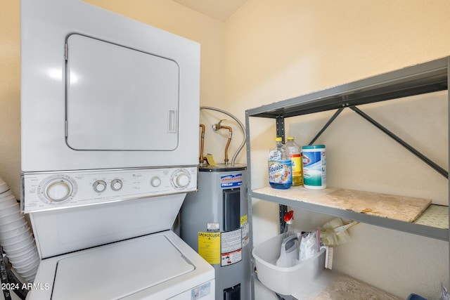 14300 W Bell Rd Unit 35, Surprise, AZ 85374 - laundry room with water heater, stacked washing maching and dryer, and laundry area