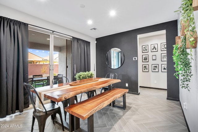 dining area with light parquet floors