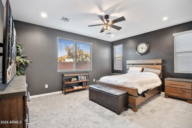 carpeted bedroom featuring ceiling fan