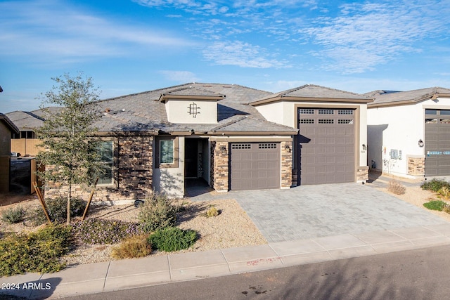 view of front of property with a garage