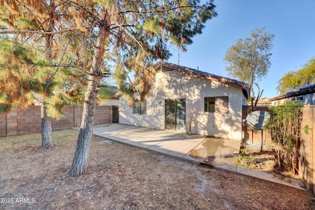 view of front of home with a patio