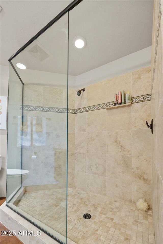 bathroom with an enclosed shower