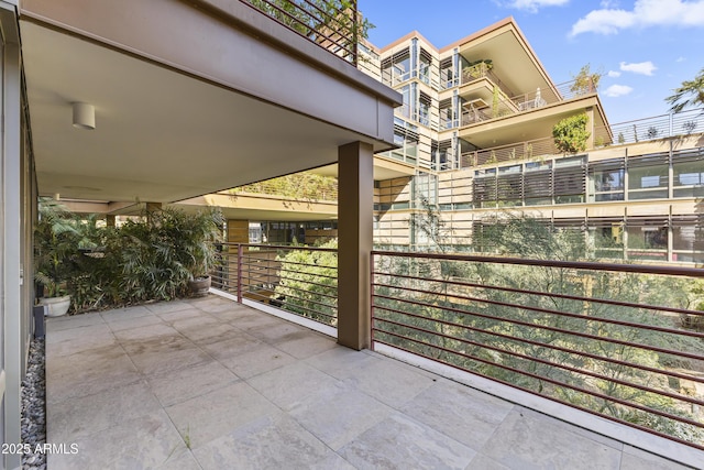 view of patio with a balcony