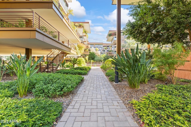 view of property's community featuring stairway