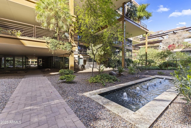 view of community with a patio