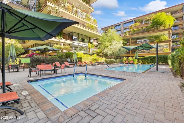 community pool with a patio