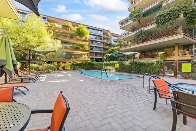 community pool featuring a patio