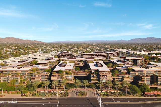 birds eye view of property featuring a mountain view