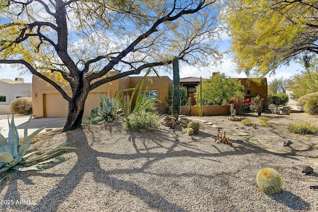 adobe home with a garage