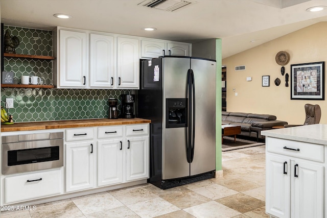 2301 E Sunnyside Dr, Phoenix, AZ 85028 - kitchen with appliances with stainless steel finishes, butcher block countertops, open shelves, white cabinetry, and recessed lighting