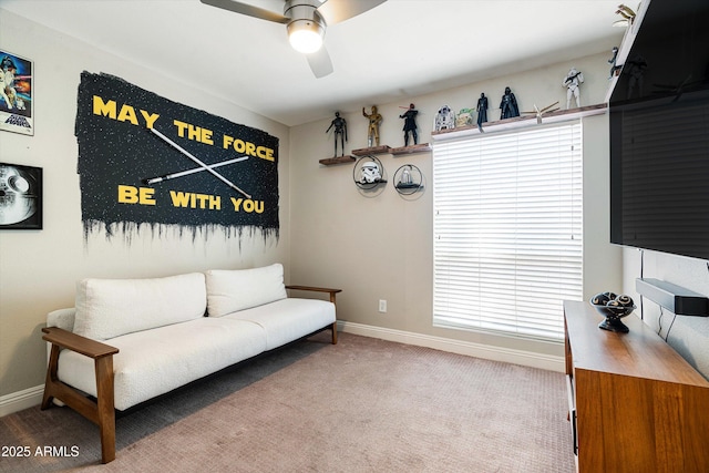 2301 E Sunnyside Dr, Phoenix, AZ 85028 - living area with ceiling fan, carpet floors, and baseboards