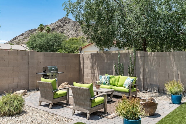 2301 E Sunnyside Dr, Phoenix, AZ 85028 - view of patio / terrace featuring outdoor lounge area, a mountain view, and area for grilling