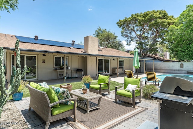 2301 E Sunnyside Dr, Phoenix, AZ 85028 - fenced backyard featuring a patio area, an outdoor hangout area, and area for grilling