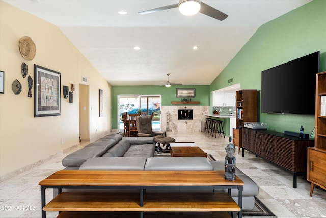 2301 E Sunnyside Dr, Phoenix, AZ 85028 - living room with ceiling fan, lofted ceiling, and a fireplace