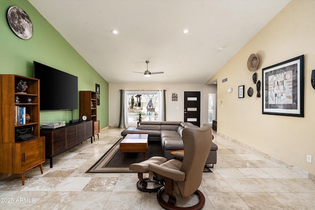 2301 E Sunnyside Dr, Phoenix, AZ 85028 - living area with a ceiling fan, stone tile floors, recessed lighting, high vaulted ceiling, and baseboards