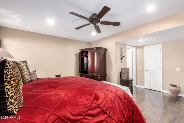 bedroom with a ceiling fan, baseboards, wood finished floors, and recessed lighting