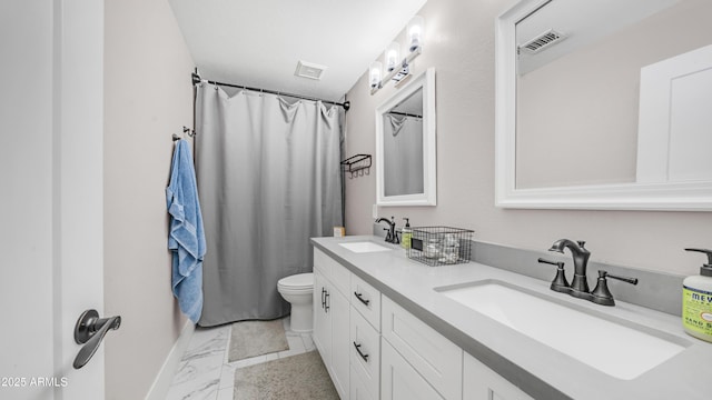 full bathroom featuring toilet, marble look tiles, double vanity, baseboards, and a shower with curtain