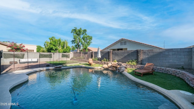 view of pool featuring a fenced backyard