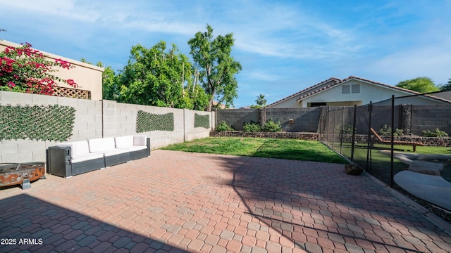 view of patio with a fenced backyard and outdoor lounge area