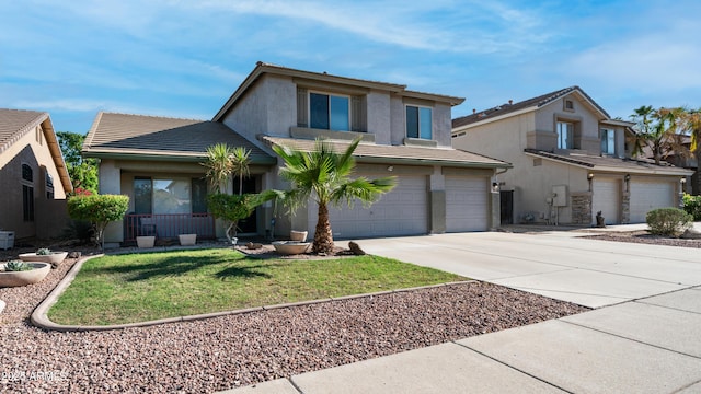 traditional home featuring a garage, stucco siding, concrete driveway, a tiled roof, and a front lawn