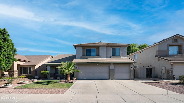 traditional home with a tiled roof, stucco siding, driveway, and a garage