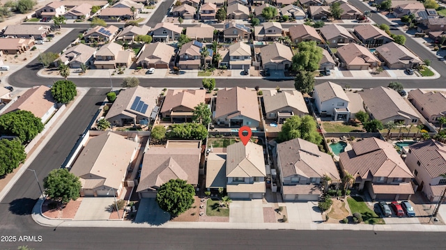aerial overview of property's location with nearby suburban area