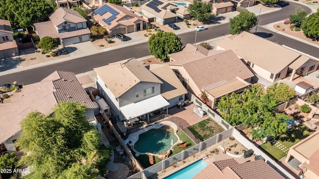 aerial perspective of suburban area with a pool