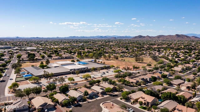 aerial view of residential area with a mountainous background