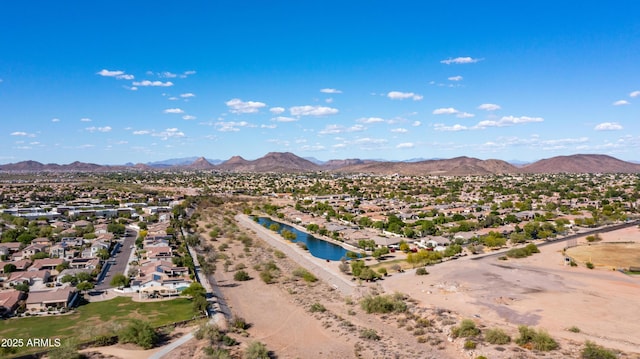 aerial view of residential area with a water and mountain view