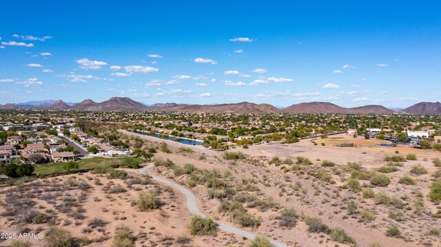 view of mountain backdrop with nearby suburban area