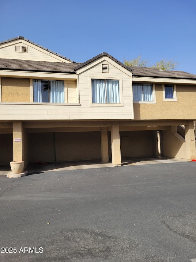 multi unit property featuring stucco siding