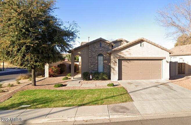 view of front of home with a garage