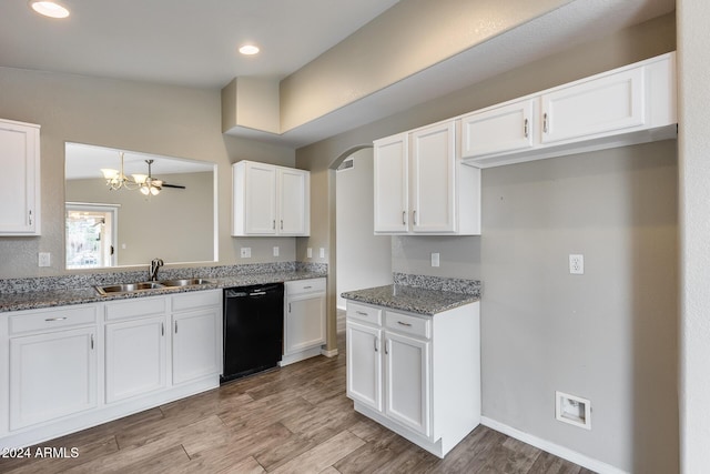 kitchen featuring sink, white cabinets, dark stone counters, and black dishwasher