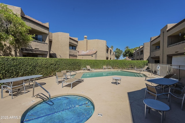 2228 N 52nd St Unit 213, Phoenix, AZ 85008 - community pool featuring fence and a patio area