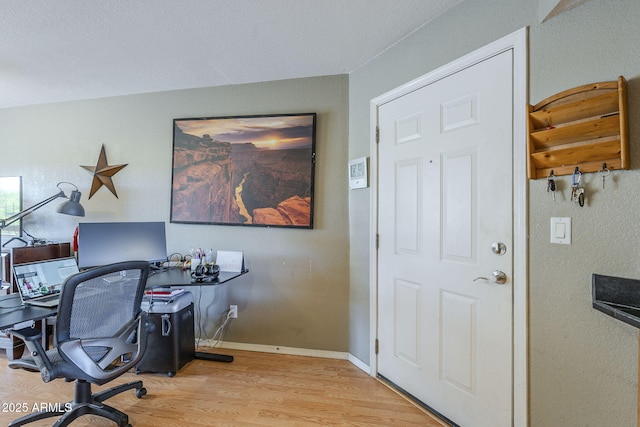 2228 N 52nd St Unit 213, Phoenix, AZ 85008 - home office with wood finished floors and baseboards