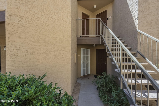 2228 N 52nd St Unit 213, Phoenix, AZ 85008 - view of exterior entry with stucco siding