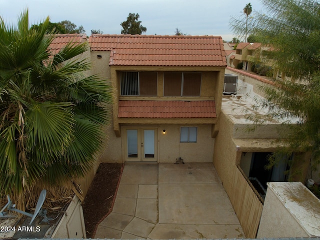 view of building exterior featuring central AC