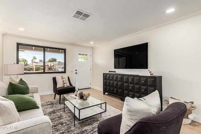 1611 W Palomino Dr, Chandler, AZ 85224 - living room with ornamental molding, wood finished floors, and recessed lighting