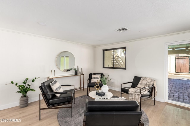 1611 W Palomino Dr, Chandler, AZ 85224 - sitting room featuring crown molding and wood finished floors