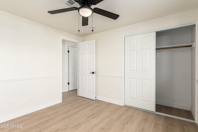1611 W Palomino Dr, Chandler, AZ 85224 - unfurnished bedroom featuring light wood-style flooring, a closet, and a ceiling fan
