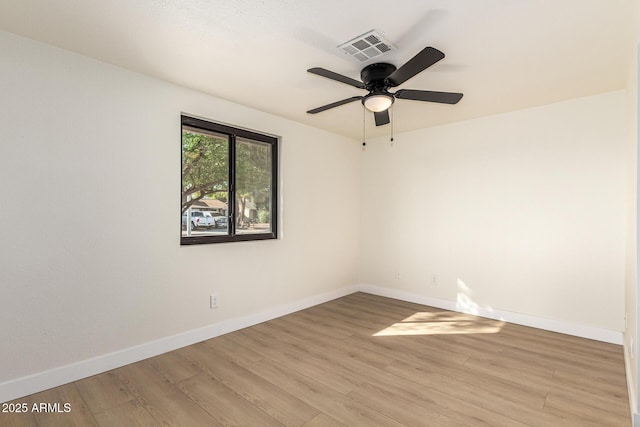 1611 W Palomino Dr, Chandler, AZ 85224 - spare room with light wood finished floors and ceiling fan