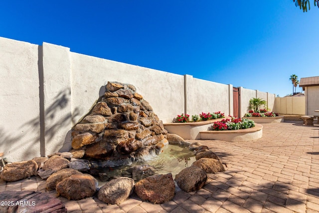 1611 W Palomino Dr, Chandler, AZ 85224 - fenced backyard featuring a patio area