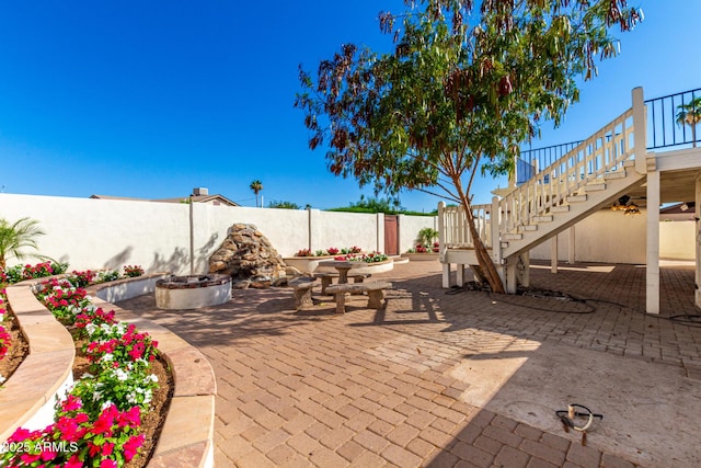 1611 W Palomino Dr, Chandler, AZ 85224 - view of patio / terrace featuring stairway and an outdoor fire pit