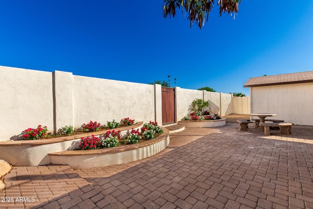 1611 W Palomino Dr, Chandler, AZ 85224 - fenced backyard with a patio area