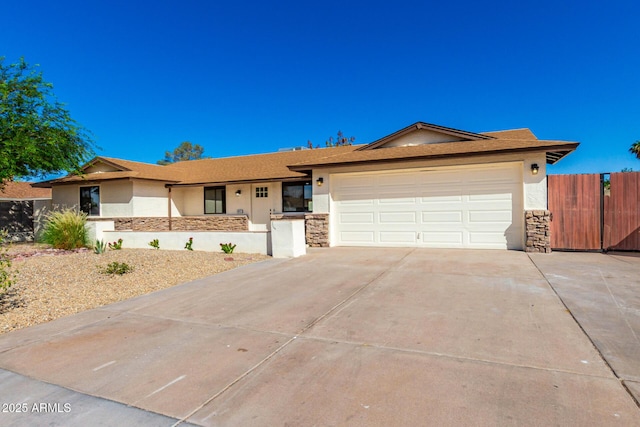 1611 W Palomino Dr, Chandler, AZ 85224 - ranch-style home featuring stucco siding, stone siding, and a garage